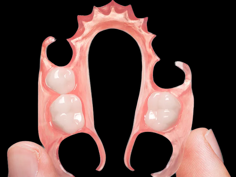 Single tooth flexible denture in black background